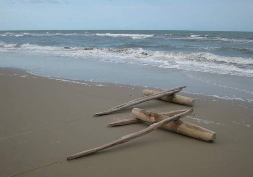 A set of rollers and tracks on the beach. These are used to move a jangada on land.