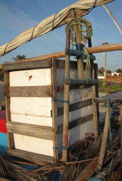 A jangada's icebox, sitting in its wood frame, tied to the espeque.