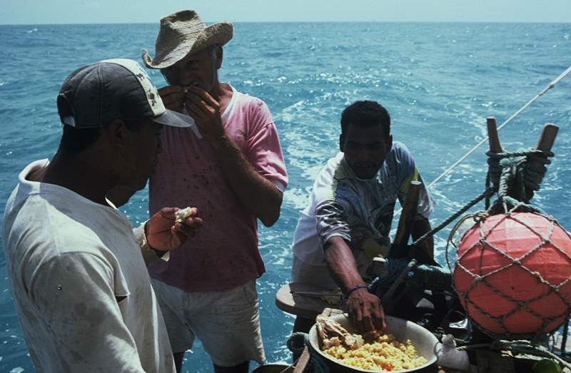 Making fish stew on a sailing jangada.