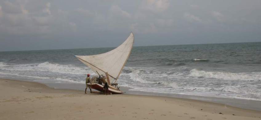 Picture series of two men leaving the beach on a paquete.