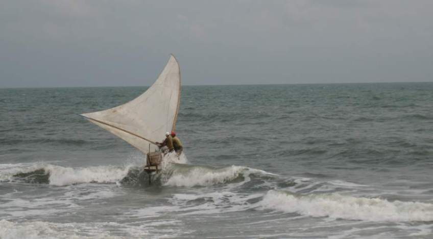 Picture series of two men leaving the beach on a paquete.