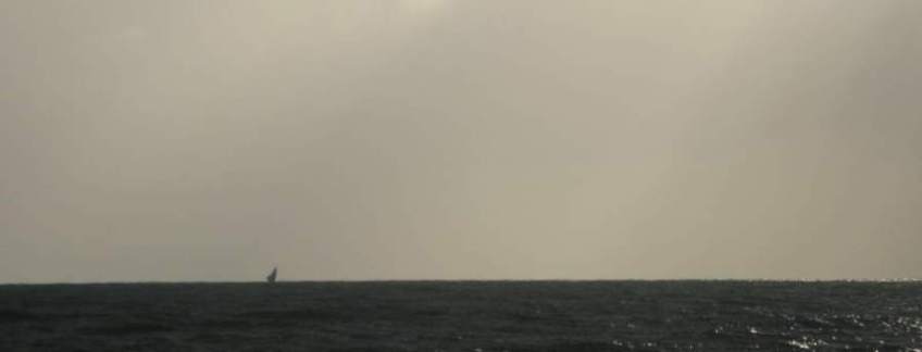 Picture series of two men leaving the beach on a paquete.